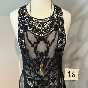 Long charm necklace.